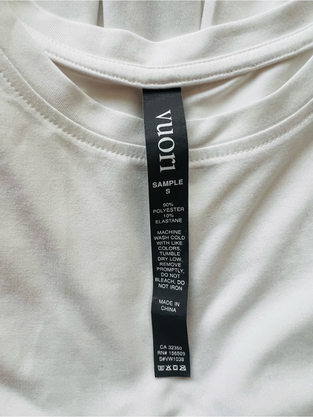 Vuori White Crew Neck Tee with Black Tag